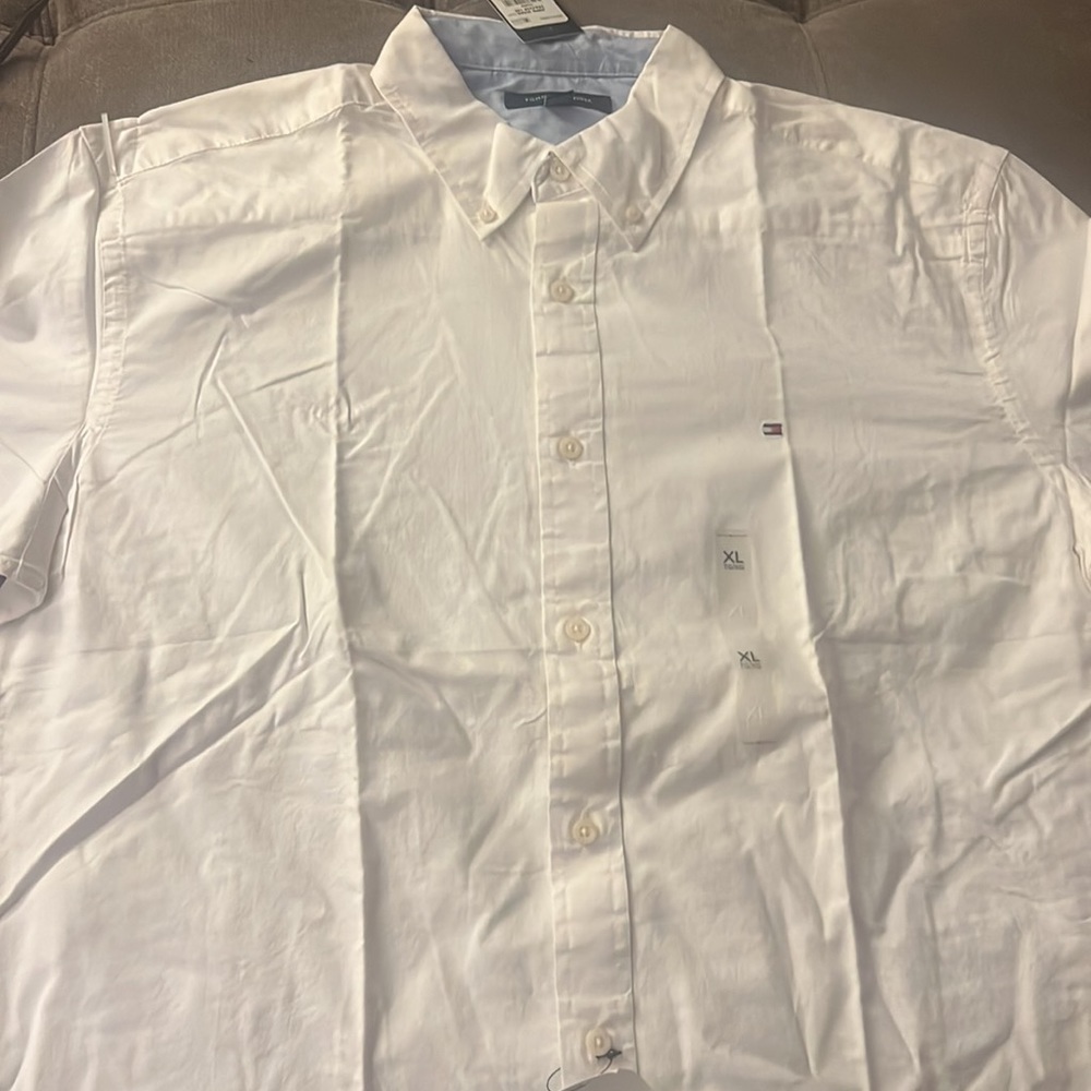 Brand new Tommy Hilfiger XL button down white shirt.